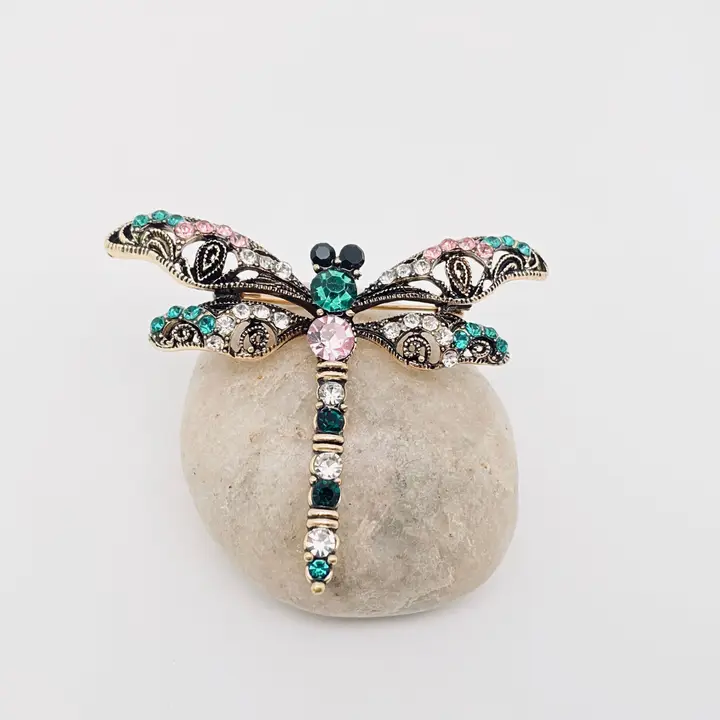 Broche libellule strass